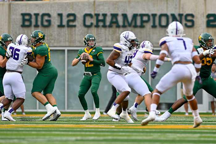 Baylor Bears quarterback Blake Shapen (12) drops back to pass against the Albany Great Danes during the first quarter at McLane Stadium.